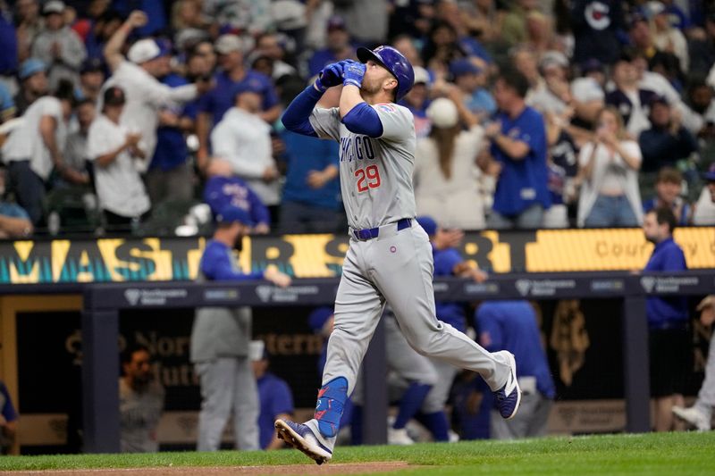 May 28, 2024; Milwaukee, Wisconsin, USA;  Chicago Cubs first baseman Michael Busch (29) celebrates after hitting a home run during the third inning against the Milwaukee Brewers at American Family Field. Mandatory Credit: Jeff Hanisch-USA TODAY Sports