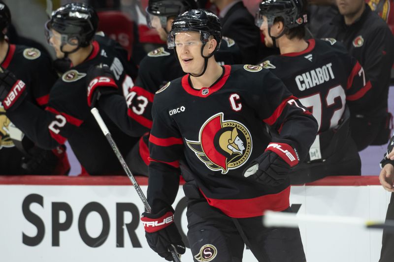 Nov 23, 2024; Ottawa, Ontario, CAN; Ottawa Senators left wing Brady Tkachuk (7) celebrates his goal scored in the second period against the Vancouver Canucks at the Canadian Tire Centre. Mandatory Credit: Marc DesRosiers-Imagn Images