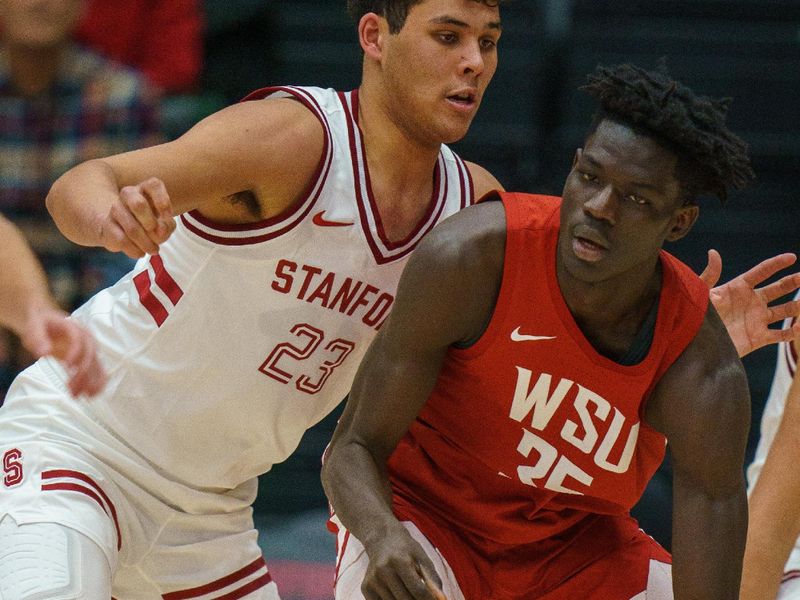 Feb 23, 2023; Stanford, California, USA;  Washington State Cougars forward Mouhamed Gueye (35) dribbles the ball against Stanford Cardinal forward Brandon Angel (23) during the first half at Maples Pavilion. Mandatory Credit: Neville E. Guard-USA TODAY Sports