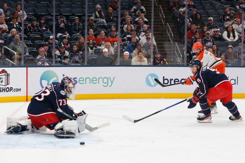 Dec 16, 2025; Columbus, Ohio, USA; Columbus Blue Jackets goalie Jet Greaves (73) makes a save on the shot from Anaheim Ducks left wing Alex Killorn (17) during the first period at Nationwide Arena. Mandatory Credit: Russell LaBounty-Imagn Images