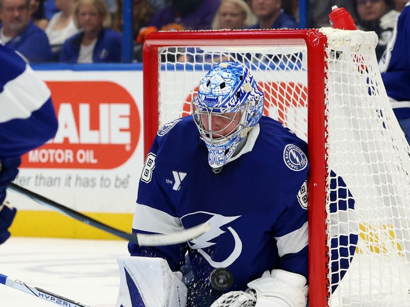 Nov 7, 2024; Tampa, Florida, USA; Tampa Bay Lightning goaltender Andrei Vasilevskiy (88) makes a save against the Philadelphia Flyers during the second period at Amalie Arena. Mandatory Credit: Kim Klement Neitzel-Imagn Images