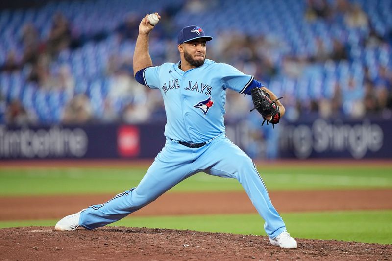 May 30, 2023; Toronto, Ontario, CAN; Toronto Blue Jays pitcher Yimi Garcia (93) pitches to the Milwaukee Brewers during the ninth inning at Rogers Centre. Mandatory Credit: John E. Sokolowski-USA TODAY Sports