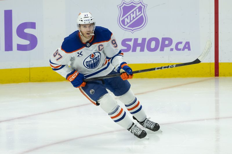 Nov 19, 2024; Ottawa, Ontario, CAN; Edmonton Oilers center Connor McDavid (97) skates in the third period against the Ottawa Senators at the Canadian Tire Centre. Mandatory Credit: Marc DesRosiers-Imagn Images