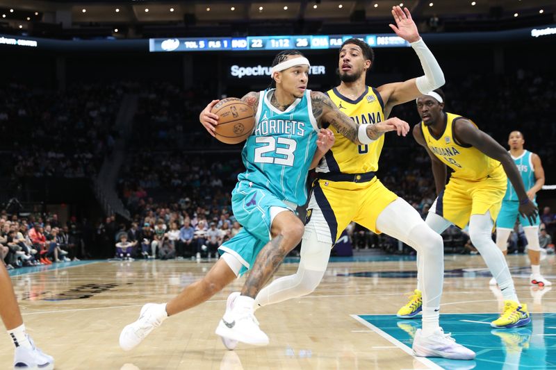 CHARLOTTE, NC - NOVEMBER 8: Tre Mann #23 of the Charlotte Hornets drives to the basket during the game against the Indiana Pacers on November 8, 2024 at Spectrum Center in Charlotte, North Carolina. NOTE TO USER: User expressly acknowledges and agrees that, by downloading and or using this photograph, User is consenting to the terms and conditions of the Getty Images License Agreement. Mandatory Copyright Notice: Copyright 2024 NBAE (Photo by Brock Williams-Smith/NBAE via Getty Images)