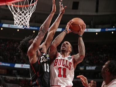 CHICAGO, IL - NOVEMBER 12: DeMar DeRozan #11 of the Chicago Bulls drives to the basket during the game against the Detroit Pistons on November 12, 2023 at United Center in Chicago, Illinois. NOTE TO USER: User expressly acknowledges and agrees that, by downloading and or using this photograph, User is consenting to the terms and conditions of the Getty Images License Agreement. Mandatory Copyright Notice: Copyright 2023 NBAE (Photo by Gary Dineen/NBAE via Getty Images)