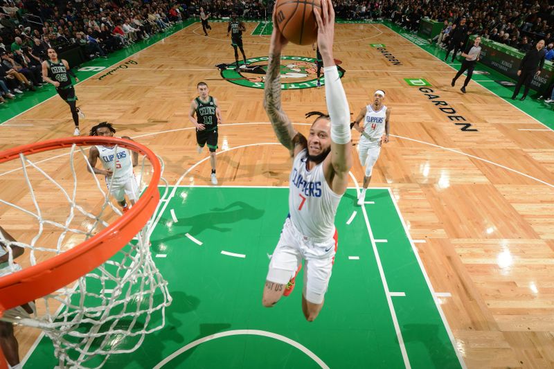 BOSTON, MA - JANUARY 27: Amir Coffey #7 of the LA Clippers drives to the basket during the game against the Boston Celtics on January 27, 2024 at the TD Garden in Boston, Massachusetts. NOTE TO USER: User expressly acknowledges and agrees that, by downloading and or using this photograph, User is consenting to the terms and conditions of the Getty Images License Agreement. Mandatory Copyright Notice: Copyright 2024 NBAE  (Photo by Brian Babineau/NBAE via Getty Images)