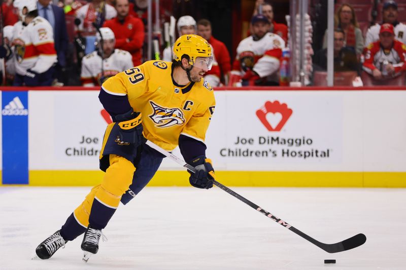 Mar 21, 2024; Sunrise, Florida, USA; Nashville Predators defenseman Roman Josi (59) moves the puck against the Florida Panthers during the first period at Amerant Bank Arena. Mandatory Credit: Sam Navarro-USA TODAY Sports