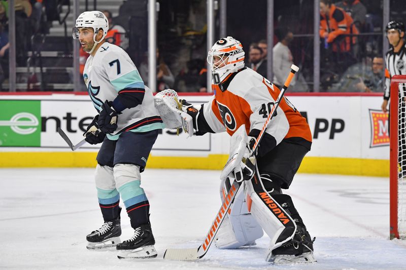 Feb 10, 2024; Philadelphia, Pennsylvania, USA; Seattle Kraken right wing Jordan Eberle (7) screens Philadelphia Flyers goaltender Cal Petersen (40) during the second period at Wells Fargo Center. Mandatory Credit: Eric Hartline-USA TODAY Sports