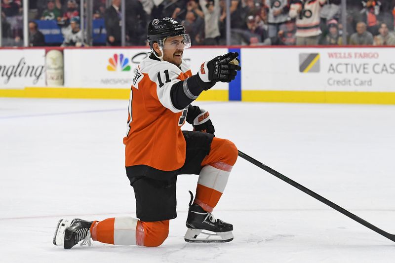 Nov 11, 2024; Philadelphia, Pennsylvania, USA; Philadelphia Flyers right wing Travis Konecny (11) celebrates his goal against the San Jose Sharks during the first period at Wells Fargo Center. Mandatory Credit: Eric Hartline-Imagn Images