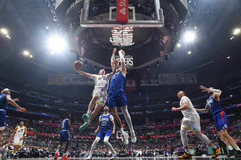 LOS ANGELES, CA - APRIL 12: Jason Preston #10 of the Utah Jazz drives to the basket during the game against the LA Clippers on April 12, 2024 at Crypto.Com Arena in Los Angeles, California. NOTE TO USER: User expressly acknowledges and agrees that, by downloading and/or using this Photograph, user is consenting to the terms and conditions of the Getty Images License Agreement. Mandatory Copyright Notice: Copyright 2024 NBAE (Photo by Adam Pantozzi/NBAE via Getty Images)