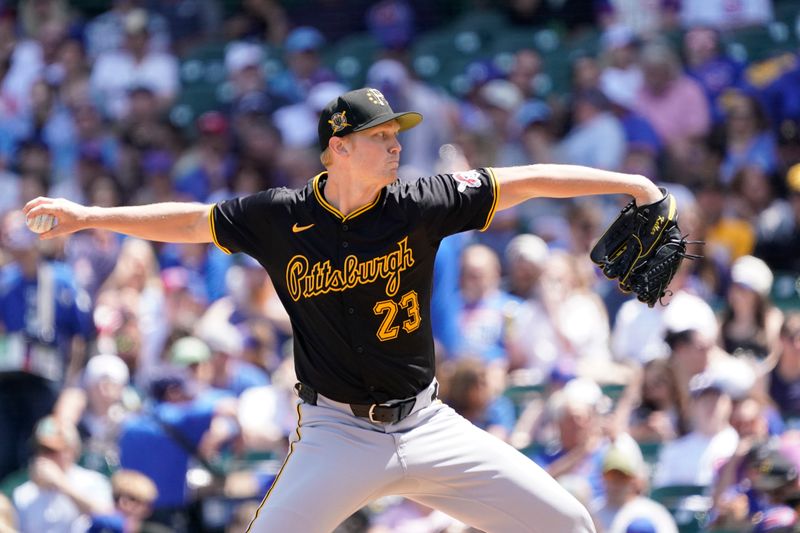 May 19, 2024; Chicago, Illinois, USA; Pittsburgh Pirates pitcher Mitch Keller (23) throws the ball against the Chicago Cubs during the first inning at Wrigley Field. Mandatory Credit: David Banks-USA TODAY Sports