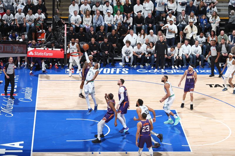 MINNEAPOLIS, MN -  APRIL 23: Jaden McDaniels #3 of the Minnesota Timberwolves shoots the ball during the game against the Phoenix Suns  during Round 1 Game 2 of the 2024 NBA Playoffs on April 23, 2024 at Target Center in Minneapolis, Minnesota. NOTE TO USER: User expressly acknowledges and agrees that, by downloading and or using this Photograph, user is consenting to the terms and conditions of the Getty Images License Agreement. Mandatory Copyright Notice: Copyright 2024 NBAE (Photo by David Sherman/NBAE via Getty Images)