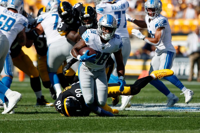 Detroit Lions running back Jermar Jefferson (28) is tackled for a loss during a preseason NFL football game, Sunday, Aug. 28, 2022, in Pittsburgh, PA. (AP Photo/Matt Durisko)