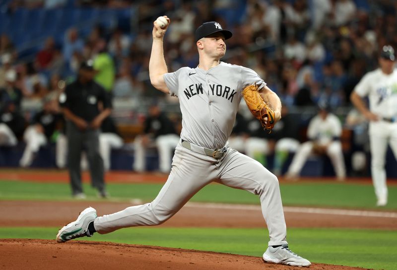 May 10, 2024; St. Petersburg, Florida, USA;  New York Yankees pitcher Clarke Schmidt (36) throws a pitch against the Tampa Bay Rays during the first inning at Tropicana Field. Mandatory Credit: Kim Klement Neitzel-USA TODAY Sports