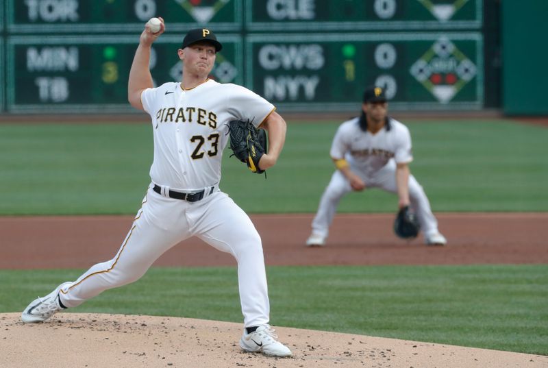 Jun 6, 2023; Pittsburgh, Pennsylvania, USA;  Pittsburgh Pirates starting pitcher Mitch Keller (23) delivers a pitch against the Oakland Athletics during the first inning at PNC Park. Mandatory Credit: Charles LeClaire-USA TODAY Sports