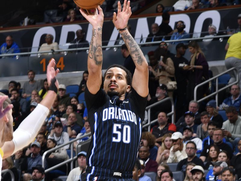 ORLANDO, FL - JANUARY 5 :  Cole Anthony #50 of the Orlando Magic shoots the ball during the game against the Utah Jazz on January 5, 2025 at Kia Center in Orlando, Florida. NOTE TO USER: User expressly acknowledges and agrees that, by downloading and or using this photograph, User is consenting to the terms and conditions of the Getty Images License Agreement. Mandatory Copyright Notice: Copyright 2025 NBAE (Photo by Gary Bassing/NBAE via Getty Images)