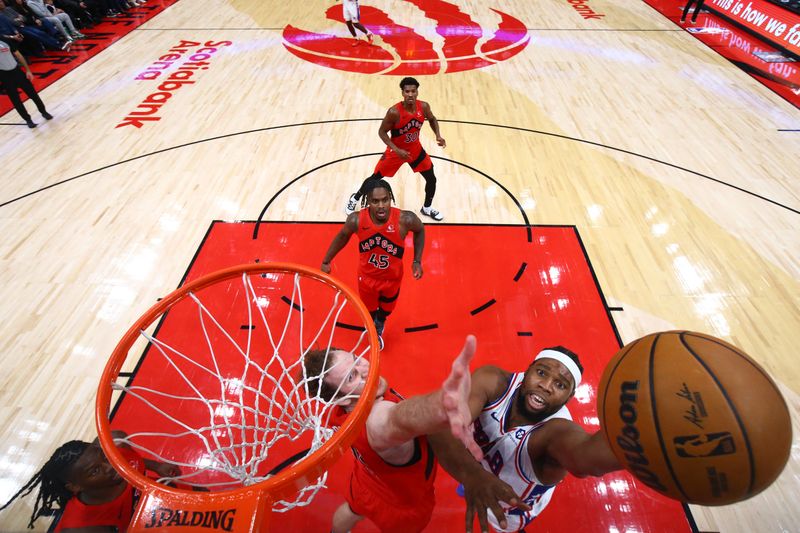 TORONTO, CANADA - OCTOBER 25: Guerschon Yabusele #28 of the Philadelphia 76ers drives to the basket during the game against the Toronto Raptors on October 25, 2024 at the Scotiabank Arena in Toronto, Ontario, Canada.  NOTE TO USER: User expressly acknowledges and agrees that, by downloading and or using this Photograph, user is consenting to the terms and conditions of the Getty Images License Agreement.  Mandatory Copyright Notice: Copyright 2024 NBAE (Photo by Vaughn Ridley/NBAE via Getty Images)