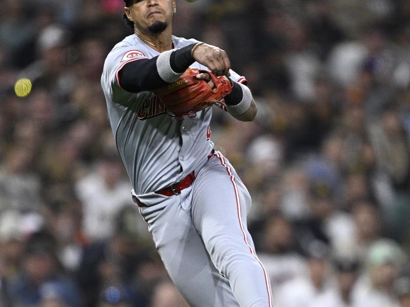 Apr 29, 2024; San Diego, California, USA; Cincinnati Reds third baseman Santiago Espinal (4) throws to first base on a ground out by San Diego Padres third baseman Manny Machado (not pictured) during the seventh inning at Petco Park. Mandatory Credit: Orlando Ramirez-USA TODAY Sports