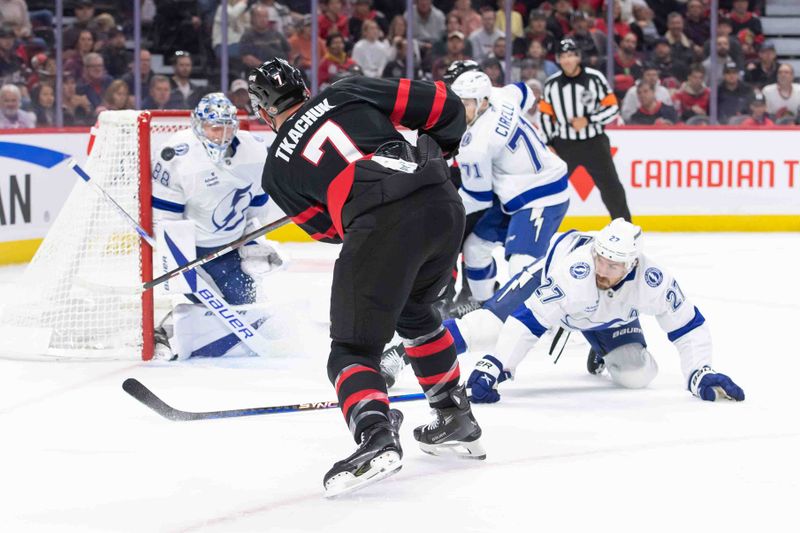 Oct 19, 2024; Ottawa, Ontario, CAN; Ottawa Senators left wing Brady Tkachuk (7) shoots the puck on Tampa Bay Lightning goalie Andrei Vasilevskiy (88) in the first period at the Canadian Tire Centre. Mandatory Credit: Marc DesRosiers-Imagn Images