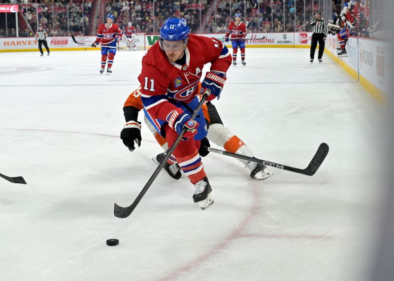 Apr 9, 2024; Montreal, Quebec, CAN; Montreal Canadiens forward Brendan Gallagher (11) plays the puck during the second period of the game against the Philadelphia Flyers at the Bell Centre. Mandatory Credit: Eric Bolte-USA TODAY Sports