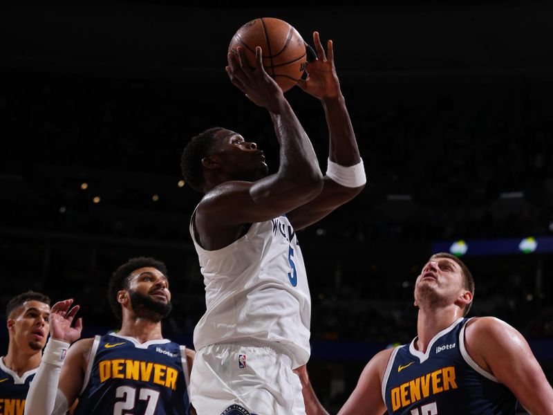 DENVER, CO - APRIL 10: Anthony Edwards #5 of the Minnesota Timberwolves shoots the ball during the game against the Denver Nuggets on April 10, 2024 at the Ball Arena in Denver, Colorado. NOTE TO USER: User expressly acknowledges and agrees that, by downloading and/or using this Photograph, user is consenting to the terms and conditions of the Getty Images License Agreement. Mandatory Copyright Notice: Copyright 2024 NBAE (Photo by Bart Young/NBAE via Getty Images)