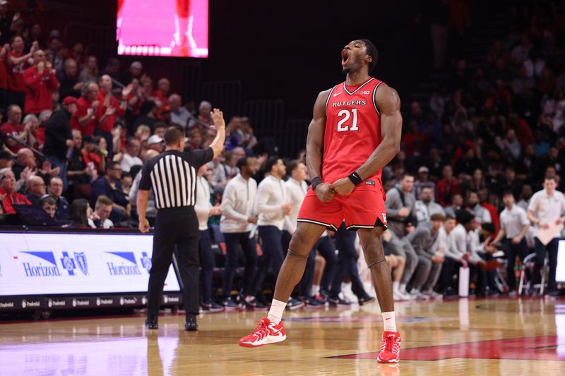 Mar 8, 2026; Piscataway, New Jersey, USA; Rutgers Scarlet Knights center Emmanuel Ogbole (21) reacts during the first half against the Penn State Nittany Lions at Jersey Mike's Arena. Mandatory Credit: Vincent Carchietta-Imagn Images