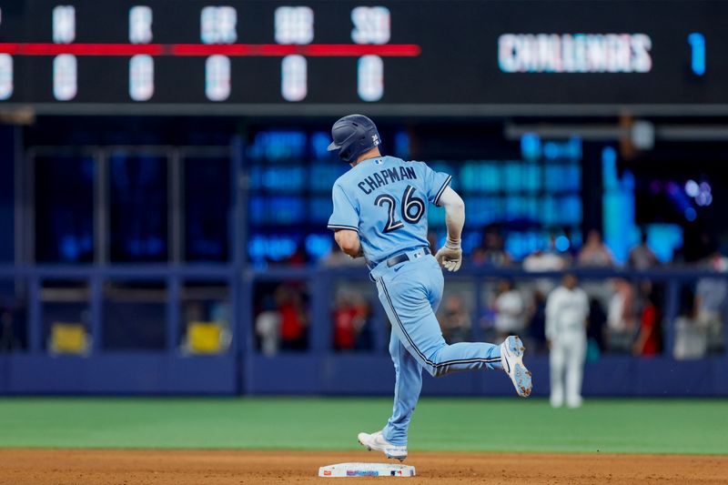 Jun 21, 2023; Miami, Florida, USA; Toronto Blue Jays third baseman Matt Chapman (26) circles the bases after hitting a home run against the Miami Marlins during the eighth inning at loanDepot Park. Mandatory Credit: Sam Navarro-USA TODAY Sports