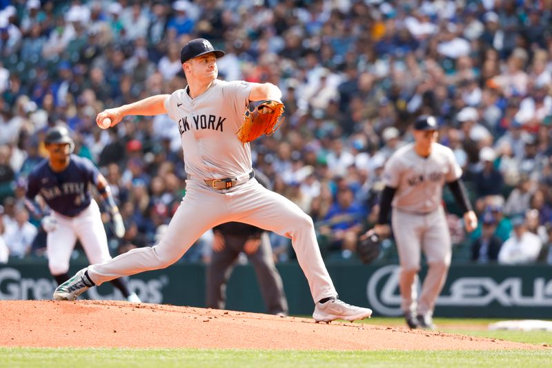 Sep 19, 2024; Seattle, Washington, USA; New York Yankees starting pitcher Clarke Schmidt (36) throws against the Seattle Mariners during the first inning at T-Mobile Park. Mandatory Credit: Joe Nicholson-Imagn Images