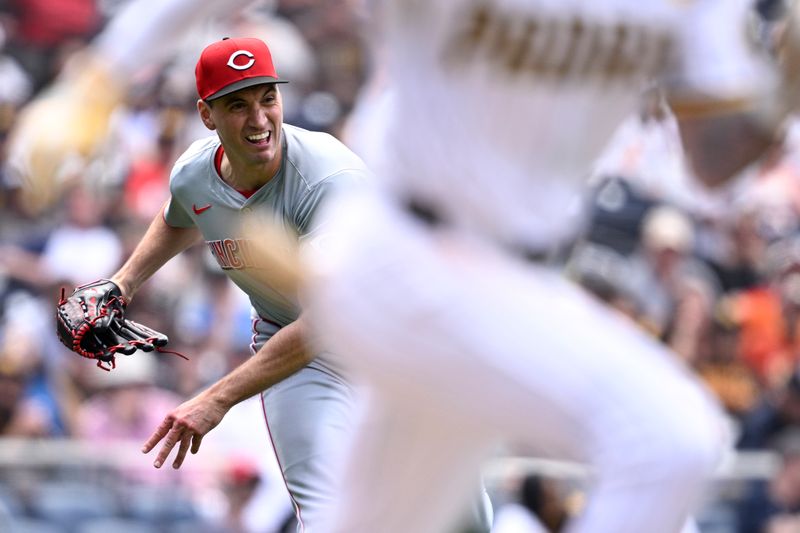 May 1, 2024; San Diego, California, USA; Cincinnati Reds relief pitcher Brent Suter (31) throws to first base on a ground out by San Diego Padres center fielder Jackson Merrill (3) during the eighth inning at Petco Park. Mandatory Credit: Orlando Ramirez-USA TODAY Sports