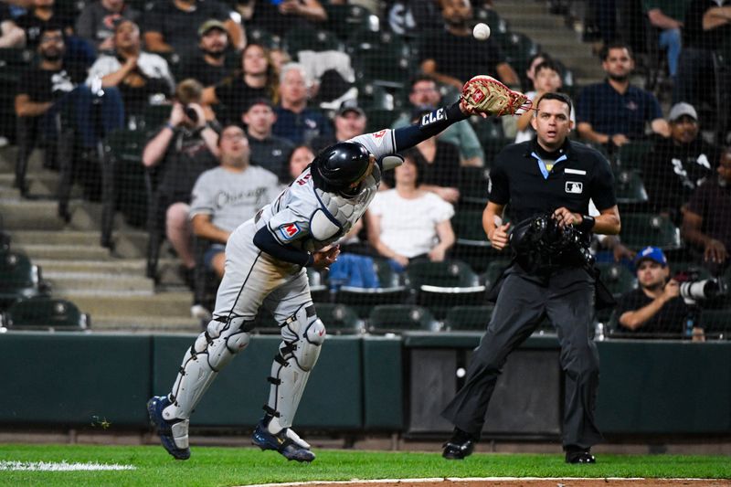 Sep 9, 2024; Chicago, Illinois, USA;  Cleveland Guardians catcher Bo Naylor (23) can not catch a foul ball during the eighth inning against the Chicago White Sox at Guaranteed Rate Field. Mandatory Credit: Matt Marton-Imagn Images