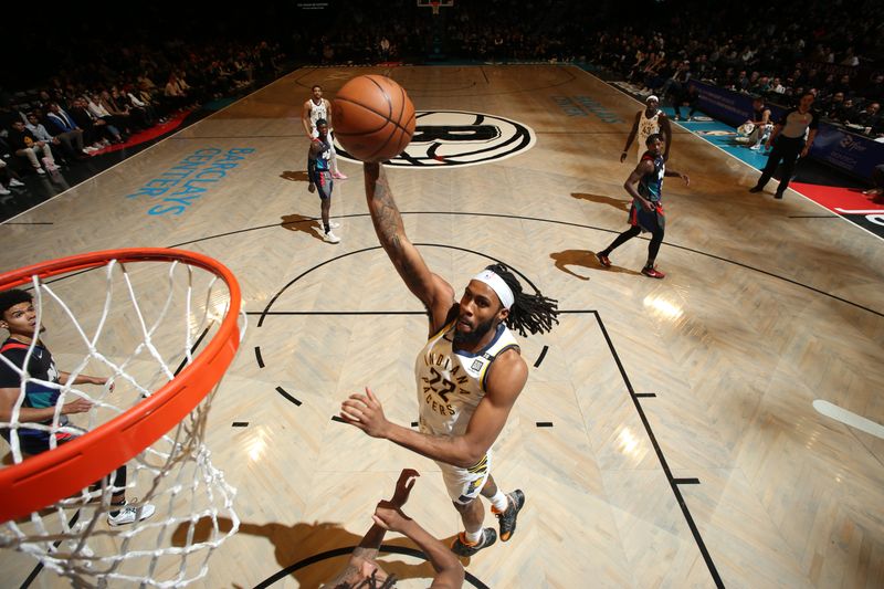 BROOKLYN, NY - APRIL 3: Isaiah Jackson #22 of the Indiana Pacers drives to the basket during the game against the Brooklyn Nets on April 3, 2024 at Barclays Center in Brooklyn, New York. NOTE TO USER: User expressly acknowledges and agrees that, by downloading and or using this Photograph, user is consenting to the terms and conditions of the Getty Images License Agreement. Mandatory Copyright Notice: Copyright 2024 NBAE (Photo by Nathaniel S. Butler/NBAE via Getty Images)