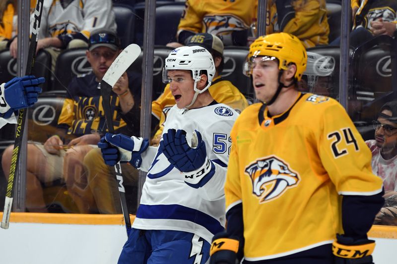 Sep 27, 2023; Nashville, Tennessee, USA; Tampa Bay Lightning forward Maxim Groshev (52) celebrates after scoring during the second period against the Nashville Predators at Bridgestone Arena. Mandatory Credit: Christopher Hanewinckel-USA TODAY Sports