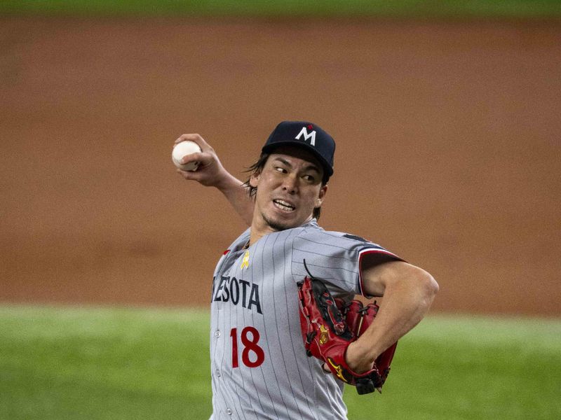 Sep 3, 2023; Arlington, Texas, USA; Minnesota Twins starting pitcher Kenta Maeda (18) pitches against the Texas Rangers during the first inning at Globe Life Field. Mandatory Credit: Jerome Miron-USA TODAY Sports