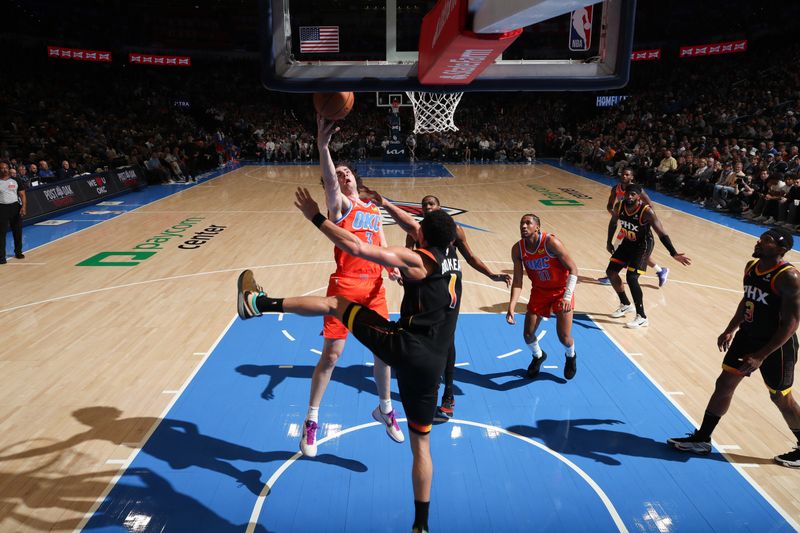 OKLAHOMA CITY, OK - MARCH 29:  Josh Giddey #3 of the Oklahoma City Thunder drives to the basket during the game against the Phoenix Suns on March 29, 2024 at Paycom Arena in Oklahoma City, Oklahoma. NOTE TO USER: User expressly acknowledges and agrees that, by downloading and or using this photograph, User is consenting to the terms and conditions of the Getty Images License Agreement. Mandatory Copyright Notice: Copyright 2024 NBAE (Photo by Zach Beeker/NBAE via Getty Images)