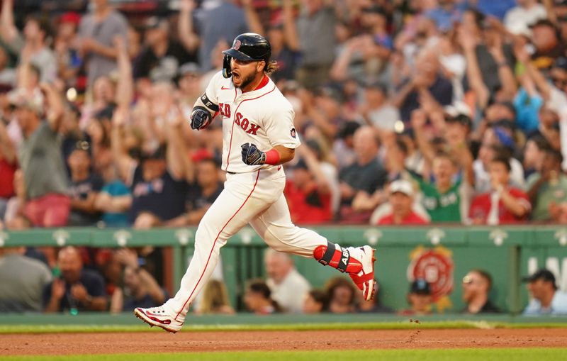 Jul 11, 2024; Boston, Massachusetts, USA; Boston Red Sox right fielder Wilyer Abreu (52) hits a home run against the Oakland Athletics in the fourth inning at Fenway Park. Mandatory Credit: David Butler II-USA TODAY Sports