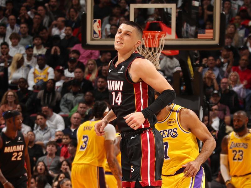 MIAMI, FL - DECEMBER 4: Tyler Herro #14 of the Miami Heat looks on during the game against the Los Angeles Lakers on December 4, 2024 at Kaseya Center in Miami, Florida. NOTE TO USER: User expressly acknowledges and agrees that, by downloading and or using this Photograph, user is consenting to the terms and conditions of the Getty Images License Agreement. Mandatory Copyright Notice: Copyright 2024 NBAE (Photo by Issac Baldizon/NBAE via Getty Images)