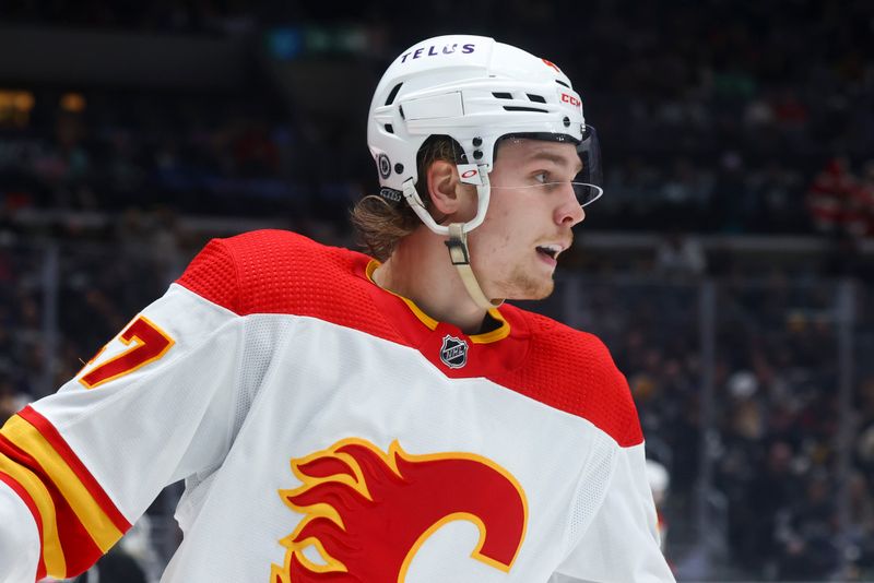 Dec 23, 2023; Los Angeles, California, USA; Calgary Flames center Connor Zary (47) looks on during the third period of a game against the Los Angeles Kings at Crypto.com Arena. Mandatory Credit: Jessica Alcheh-USA TODAY Sports