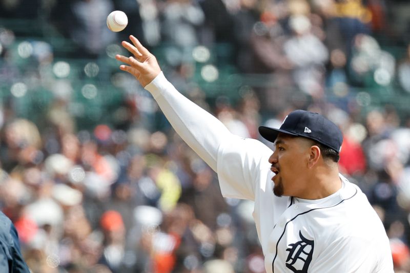 Apr 5, 2024; Detroit, Michigan, USA;  Detroit Lions offensive tackle Penni Sewell throws out the ceremonial first pitch before the game between the Detroit Tigers and the Oakland Athletics at Comerica Park. Mandatory Credit: Rick Osentoski-USA TODAY Sports