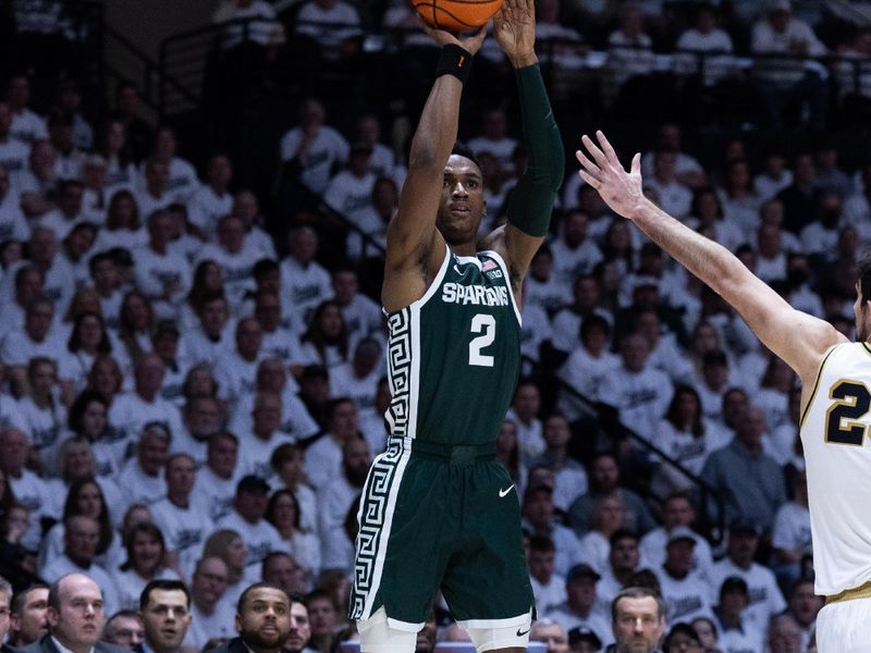 Jan 29, 2023; West Lafayette, Indiana, USA;  Michigan State Spartans guard Tyson Walker (2) shoots the ball  while Purdue Boilermakers guard Ethan Morton (25) defends in the first half at Mackey Arena. Mandatory Credit: Trevor Ruszkowski-USA TODAY Sports