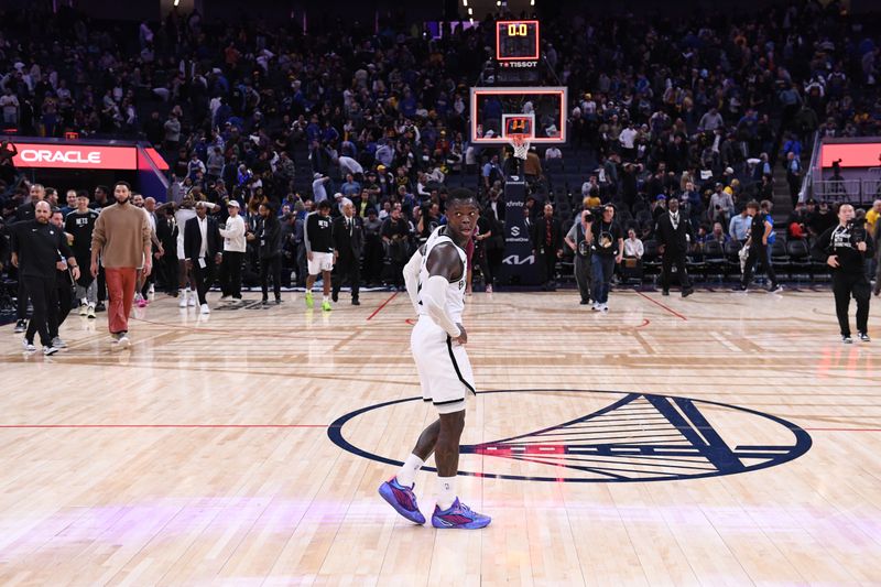 SAN FRANCISCO, CA - NOVEMBER 25: Dennis Schroder #17 of the Brooklyn Nets looks on after the game against the Golden State Warriors on November 25, 2024 at Chase Center in San Francisco, California. NOTE TO USER: User expressly acknowledges and agrees that, by downloading and or using this photograph, user is consenting to the terms and conditions of Getty Images License Agreement. Mandatory Copyright Notice: Copyright 2024 NBAE (Photo by Noah Graham/NBAE via Getty Images)