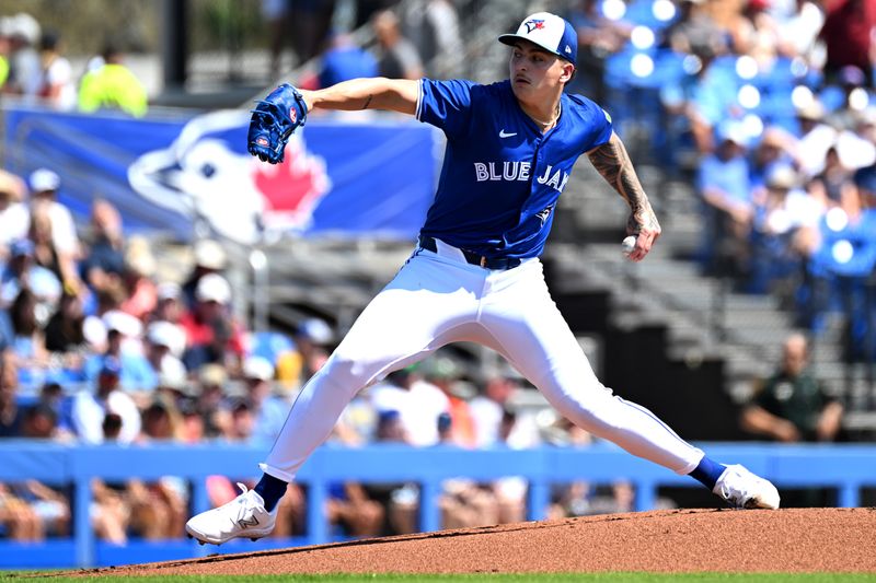 Mar 15, 2024; Dunedin, Florida, USA; Toronto Blue Jays starting pitcher Ricky Tiedemann (70) throws a pitch in the first inning of a spring training game against the Detroit Tigers at TD Ballpark. Mandatory Credit: Jonathan Dyer-USA TODAY Sports