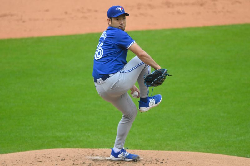 Jun 23, 2024; Cleveland, Ohio, USA; Toronto Blue Jays starting pitcher Yusei Kikuchi (16) delivers a pitch in the first inning against the Cleveland Guardians at Progressive Field. Mandatory Credit: David Richard-USA TODAY Sports