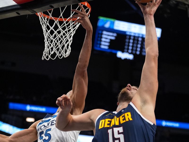 MINNEAPOLIS, MN - OCTOBER 17: Nikola Jokic #15 of the Denver Nuggets drives to the basket during the game against the Minnesota Timberwolves during a NBA Preseason game on October 17, 2024 at Target Center in Minneapolis, Minnesota. NOTE TO USER: User expressly acknowledges and agrees that, by downloading and or using this Photograph, user is consenting to the terms and conditions of the Getty Images License Agreement. Mandatory Copyright Notice: Copyright 2024 NBAE (Photo by Jordan Johnson/NBAE via Getty Images)
