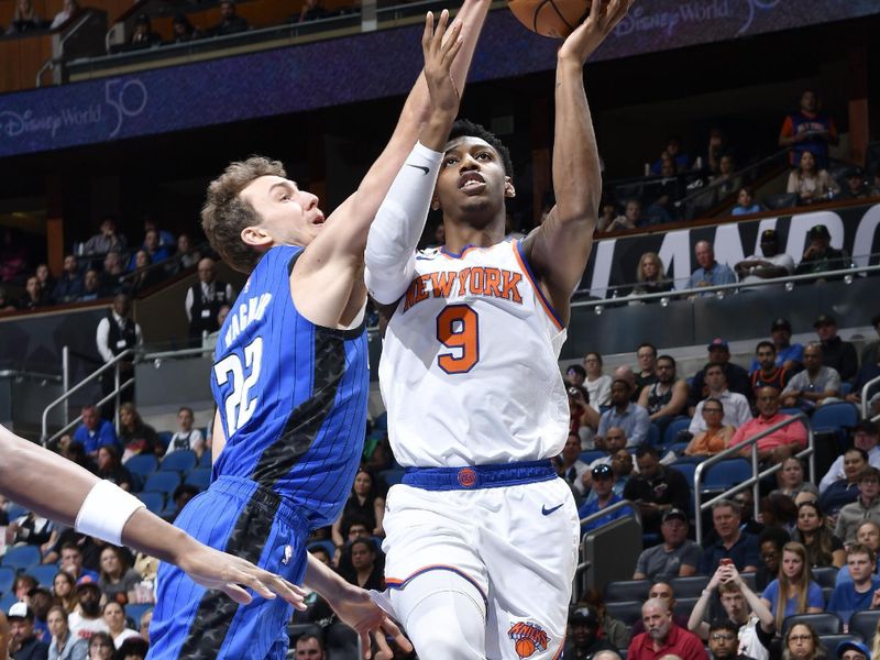 ORLANDO, FL - MARCH 23: RJ Barrett #9 of the New York Knicks drives to the basket during the game against the Orlando Magic on March 23, 2023 at Amway Center in Orlando, Florida. NOTE TO USER: User expressly acknowledges and agrees that, by downloading and or using this photograph, User is consenting to the terms and conditions of the Getty Images License Agreement. Mandatory Copyright Notice: Copyright 2023 NBAE (Photo by Gary Bassing/NBAE via Getty Images)