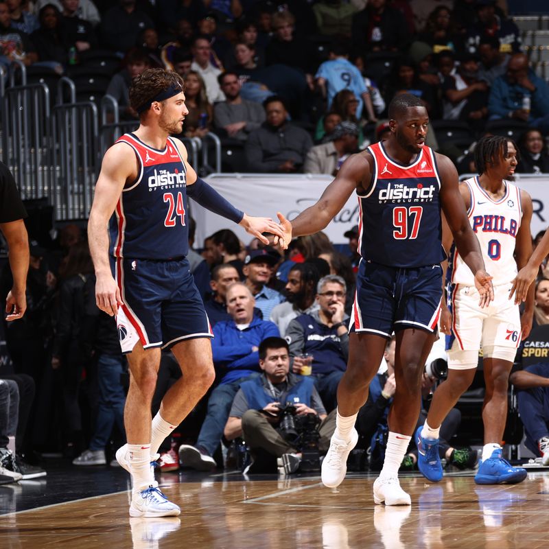 WASHINGTON, DC -? FEBRUARY 10: Corey Kispert #24 high fives Eugene Omoruyi #97 of the Washington Wizards during the game against the Philadelphia 76ers on February 10, 2024 at Capital One Arena in Washington, DC. NOTE TO USER: User expressly acknowledges and agrees that, by downloading and or using this Photograph, user is consenting to the terms and conditions of the Getty Images License Agreement. Mandatory Copyright Notice: Copyright 2024 NBAE (Photo by Kenny Giarla/NBAE via Getty Images)