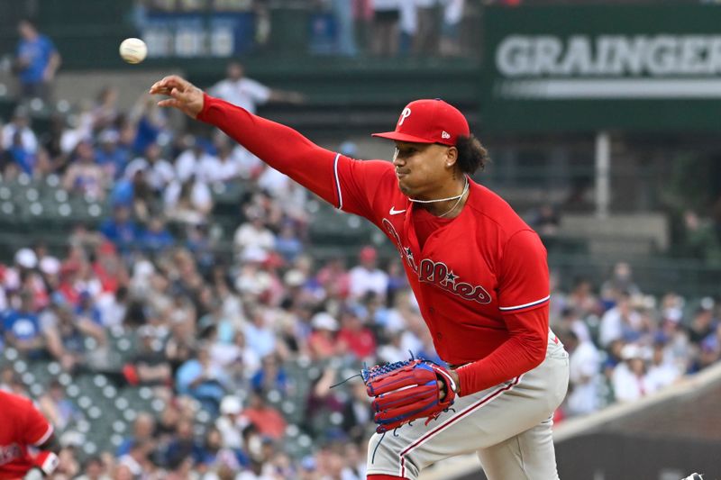 Jun 29, 2023; Chicago, Illinois, USA;  Philadelphia Phillies starting pitcher Taijuan Walker (99) delivers against the Chicago Cubsduring the first inning at Wrigley Field. Mandatory Credit: Matt Marton-USA TODAY Sports