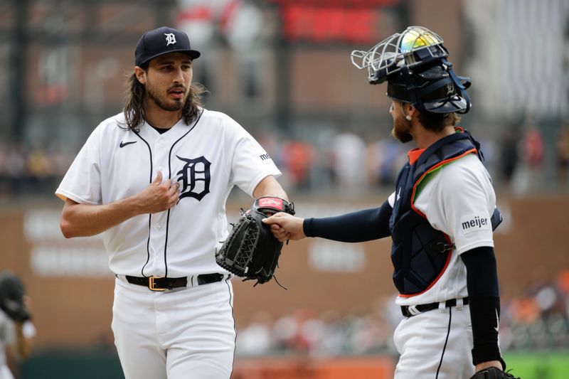 Jul 23, 2023; Detroit, Michigan, USA; Detroit Tigers pitcher Alex Faedo (49) first bumps catcher Eric Haase (13) after the third inning at Comerica Park. Mandatory Credit: Brian Bradshaw Sevald-USA TODAY Sports