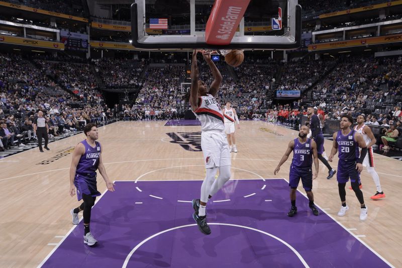 SACRAMENTO, CA - OCTOBER 28: Jabari Walker #34 of the Portland Trail Blazers dunks the ball during the game against the Sacramento Kings on October 28, 2024 at Golden 1 Center in Sacramento, California. NOTE TO USER: User expressly acknowledges and agrees that, by downloading and or using this Photograph, user is consenting to the terms and conditions of the Getty Images License Agreement. Mandatory Copyright Notice: Copyright 2024 NBAE (Photo by Rocky Widner/NBAE via Getty Images)