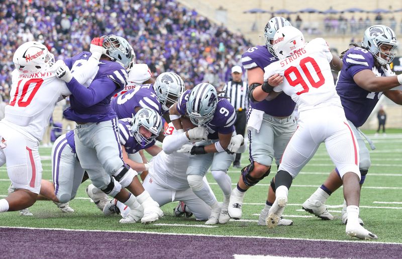 Oct 28, 2023; Manhattan, Kansas, USA; Kansas State Wildcats running back Treshaun Ward (9) scores a touchdown in the second quarter against the Houston Cougars at Bill Snyder Family Football Stadium. Mandatory Credit: Scott Sewell-USA TODAY Sports