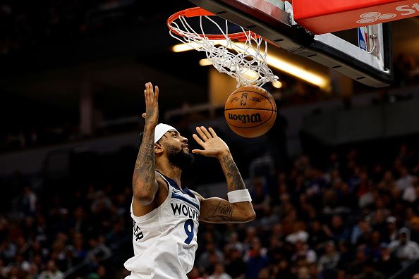 MINNEAPOLIS, MINNESOTA - NOVEMBER 30: Nickeil Alexander-Walker #9 of the Minnesota Timberwolves dunks the ball against the Utah Jazz in the fourth quarter at Target Center on November 30, 2023 in Minneapolis, Minnesota. The Timberwolves defeated the Jazz 101-90. NOTE TO USER: User expressly acknowledges and agrees that, by downloading and or using this photograph, User is consenting to the terms and conditions of the Getty Images License Agreement. (Photo by David Berding/Getty Images)